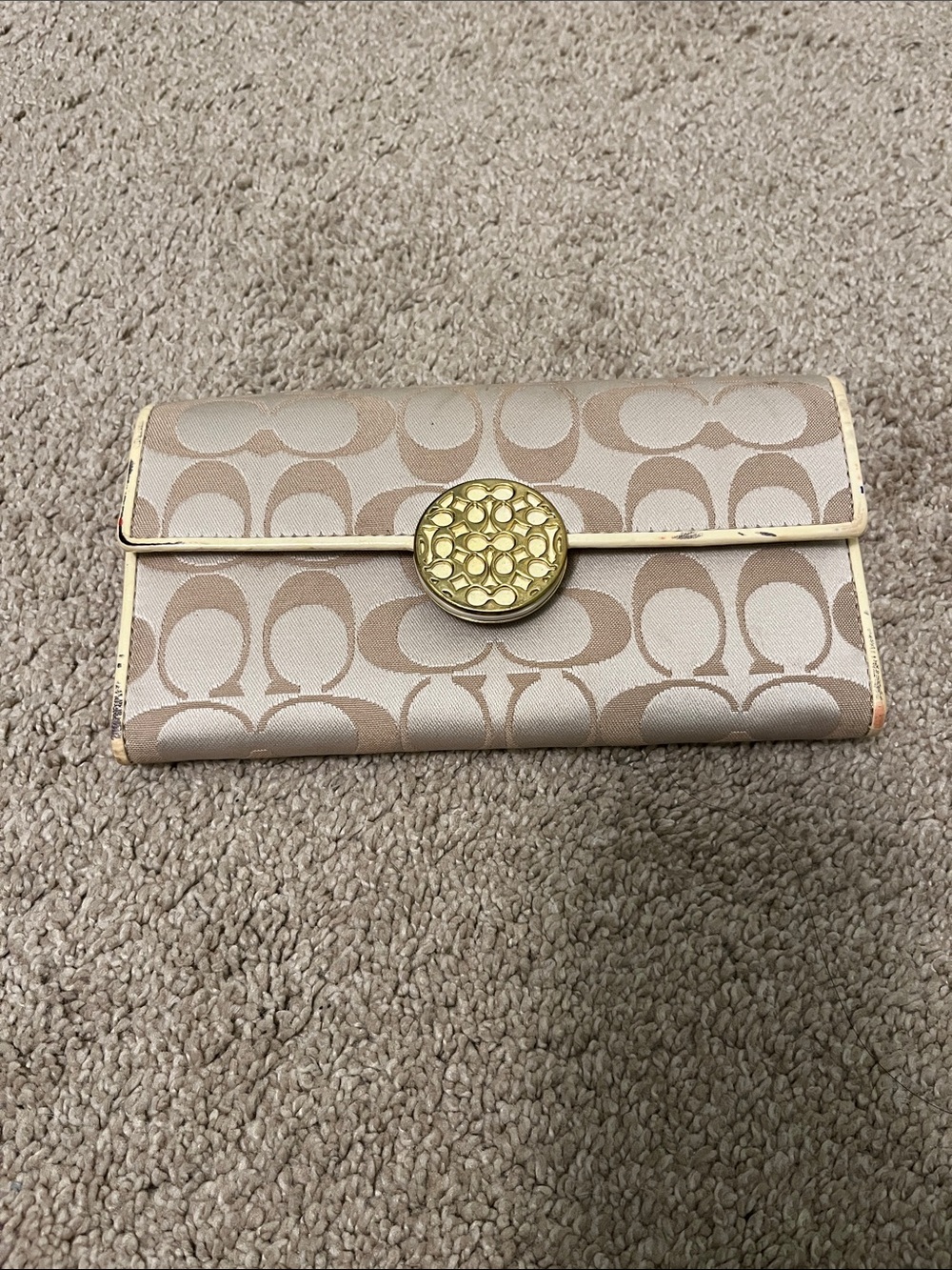 Coach Beige Signature Continental Wallet with Gold Medallion